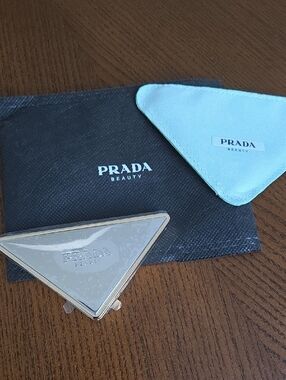New never used Prada mirror compact  silver & gold w/ green pouch W/ PRADA logo